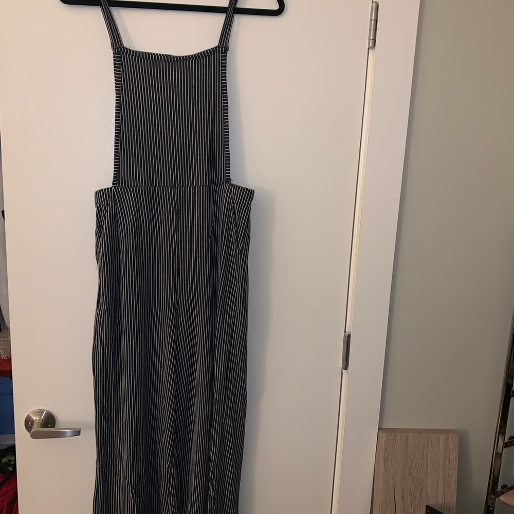 Sienna Sky black stripped overall jumpsuit